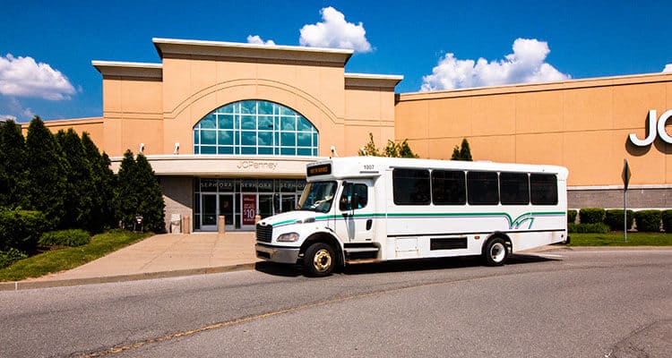 Westmoreland Transit bus stopped at JC Penney on route 14J.