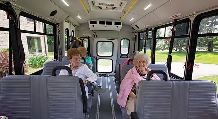 Happy seniors on a GO Westmoreland bus.